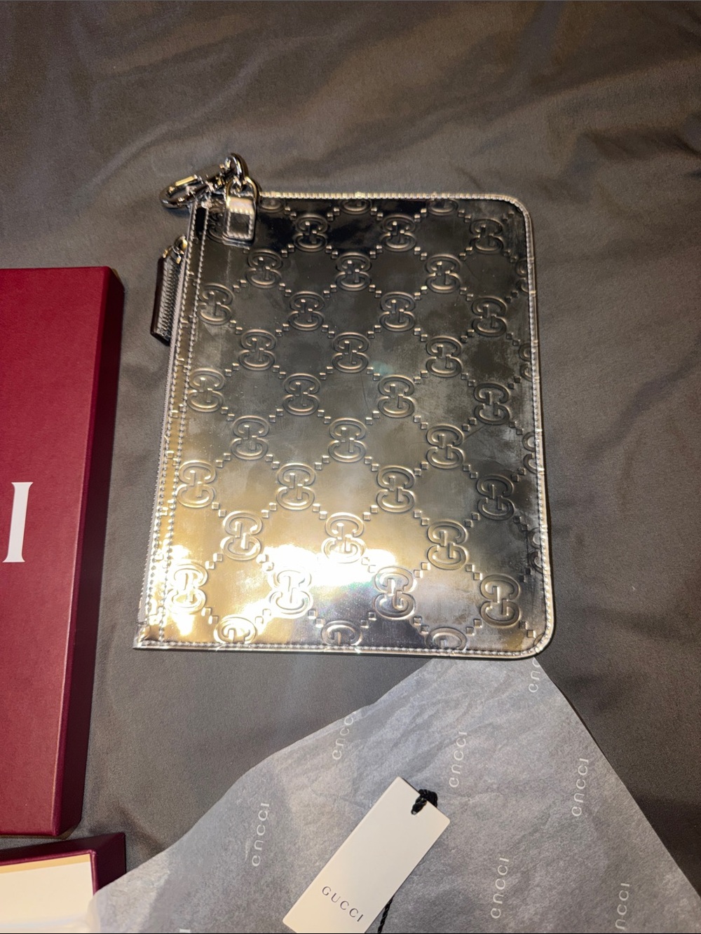 Gucci Metallic Silver GG-Embossed Zip Clutch